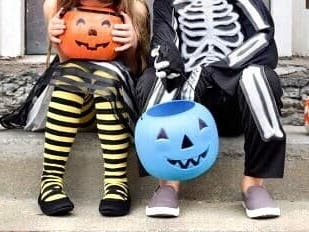The Libertyville Police Department is urging residents to be patient for children trick or treating with a blue bucket. They may have autism. 