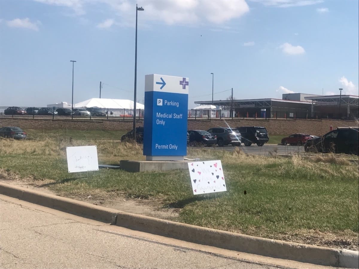 Signs expressing gratitude to healthcare workers can be found outside Advocate Sherman Hospital in Elgin.