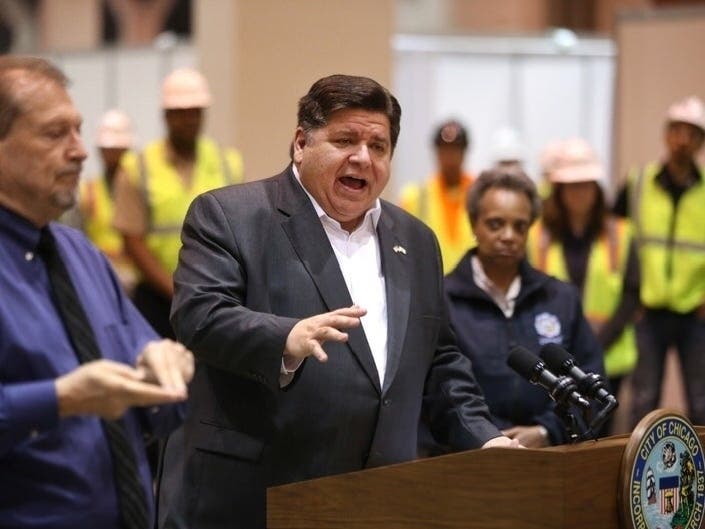 Gov. J.B. Pritzker says the state has “bent the curve” but has not yet reached its peak.