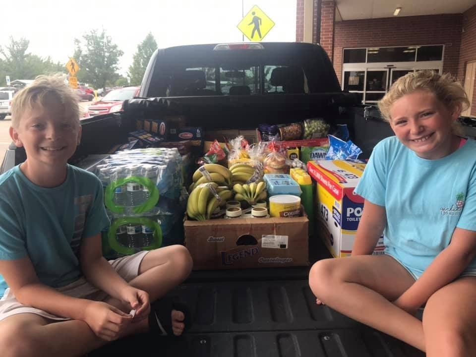 John Zemka, the owner of Tony's Cafe, said his grandchildren, Brooklyn and Brayden helped deliver food to families in recent days. 