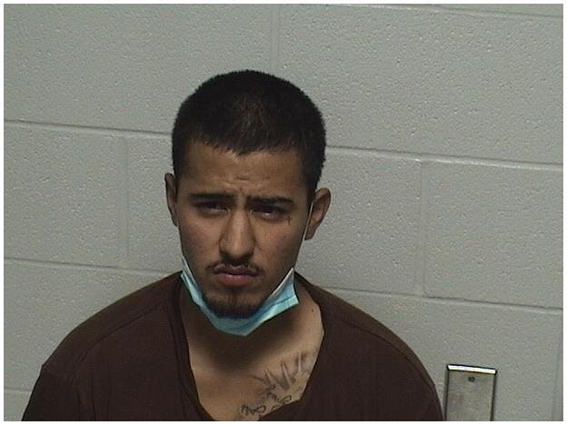 Joe Torres, 23, is charged with aggravated unlawful use of a weapon, reckless discharge of a firearm and disorderly conduct.