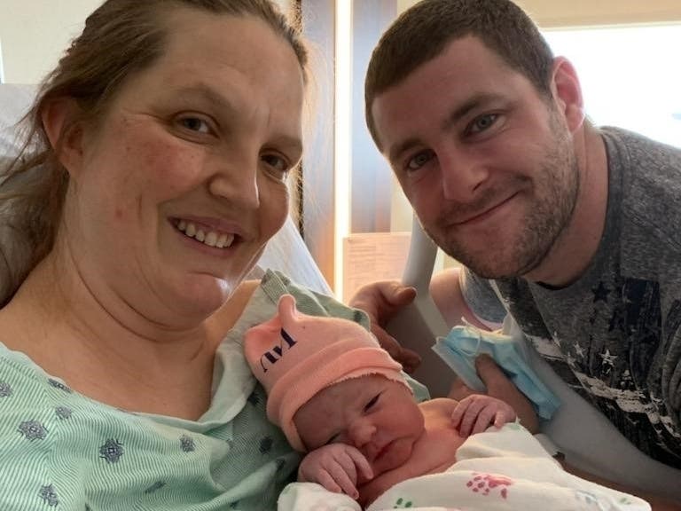 Shirie and Troy Henquinet of McHenry with their new baby girl Eevee Jo Henquinet.