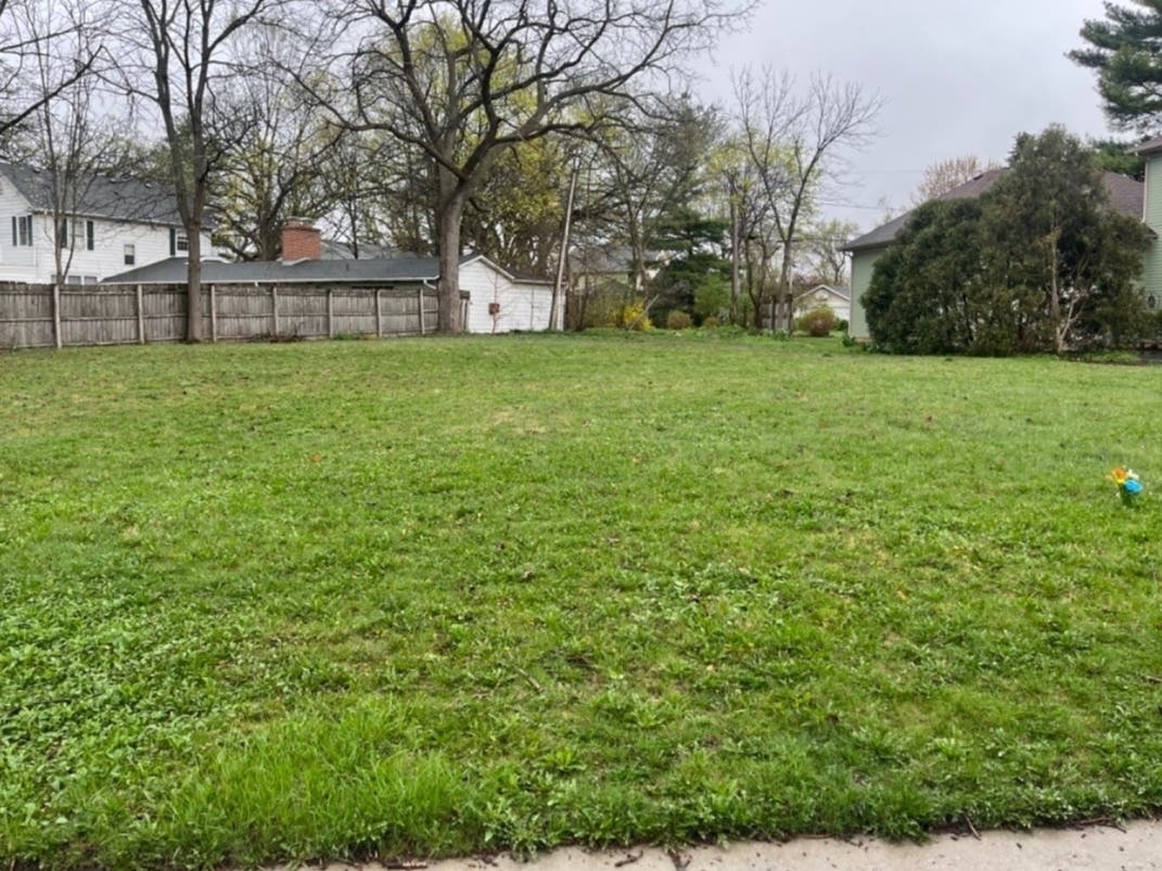 The home at 94 Dole Avenue where AJ, his parents, Joann Cunningham, and Andrew Freund, and younger brother used to live has been torn down. Flowers are still placed in the yard and AJ's photo can be spotted on nearby trees. 