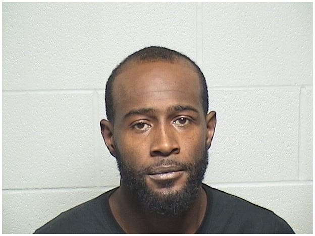 Joshua Simmons, 34, now faces charges of home invasion, domestic battery and striking a police K9. 