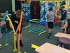 Students work together during team-building activities for Hatters Pride Day.