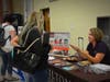 Debra Turnpaugh, admissions counselor for Milton Hershey School, shares school resources with an Armstrong parent.