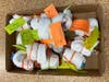 Completed sock rolls are ready to be placed in Gift of Hope packages. 