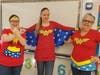 Fourth grade teachers Mrs. Zielinski and Mrs. Clayton, and Student Council Advisor Cathy Ivins all dressed as Wonder Woman for Superhero Day.