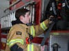 Ethan Crovetti prepares to go on a fire call.
