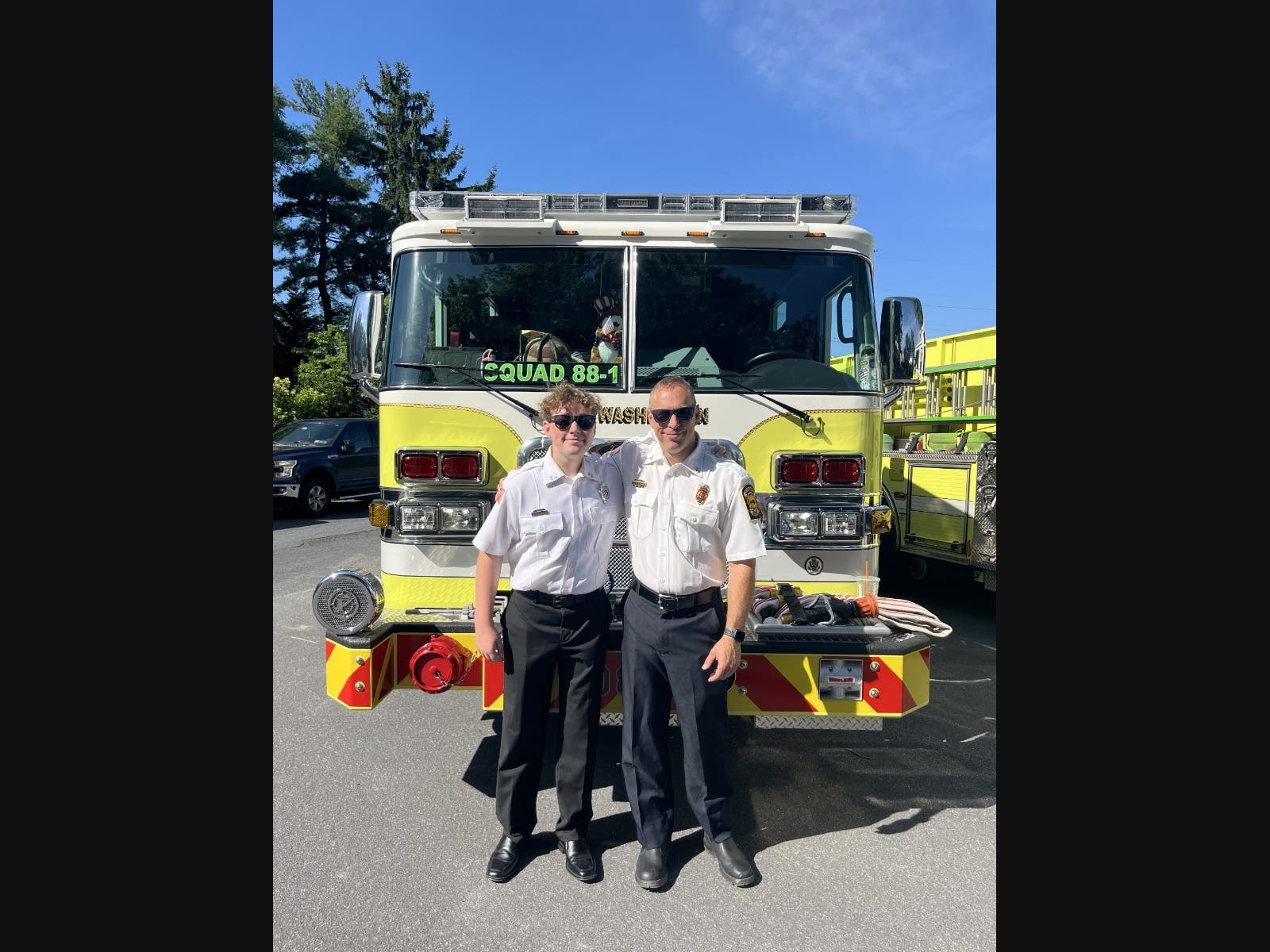Brett Clauson (left) and Eric Clauson (right) volunteer as firefighters at Fort Washington Fire Company.
