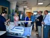 Stacy Delaney, Supervisor of DCIU’s Practical Nursing Program, leads a tour of the new simulation lab, including an advanced labor and delivery manikin.