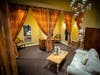 The elegantly appointed Bra Salon at à la mode with accommodating couches and comfortable chairs is the perfect venue for Galentine's Bra Fit Parties