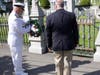 Dave Kenney and Jim Bouley, Concord's mayor, lay a wreath at the Old North Cemetery in Concord on May 27, 2019.