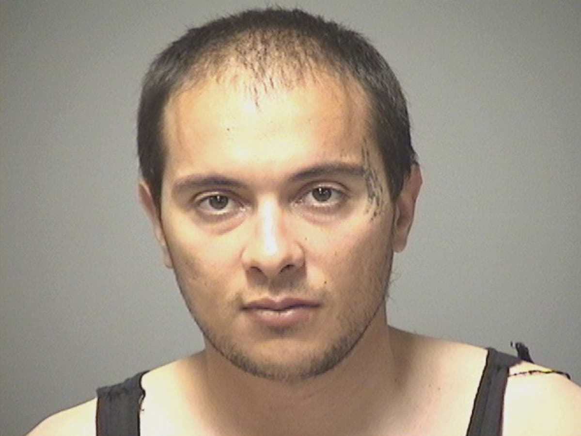 Khalid Dibi was arrested Wednesday and accused of saying he wanted to report a stolen gun and then pointing it at police. 