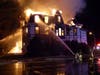 Firefighters attack a blaze at the Morrison Lodge, a Masonic temple in Northwood, on Sept. 28.
