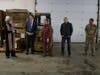 Terry Odell, an interfaith minister, offered blessing to the Capital Region Food Program holiday packages on Dec. 17.