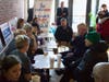 Former Gov. William Weld speaks with American Cancer Society activists at Revelstoke Coffee in Concord on Jan. 17.