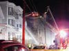An apartment fire on Spruce Street in the Queen City went to three alarms March 14. 
