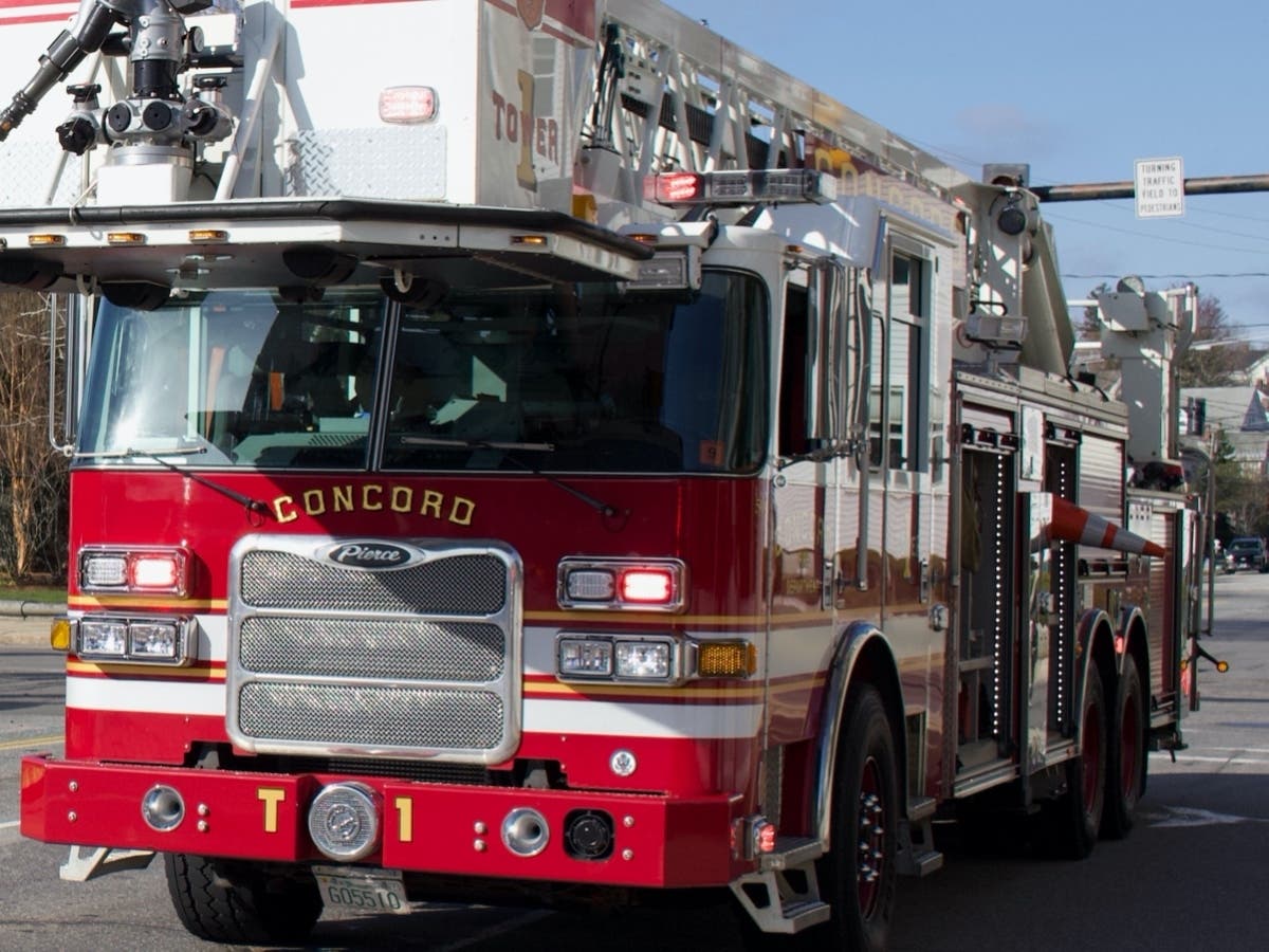 Numerous firefighters including teams from Concord worked to extinguish a fatal fire in Salisbury Sunday. 