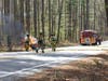Concord firefighters extinguish a car fire on Little Pond Road May 12.