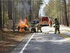 Concord firefighters extinguish a car fire on Little Pond Road May 12.