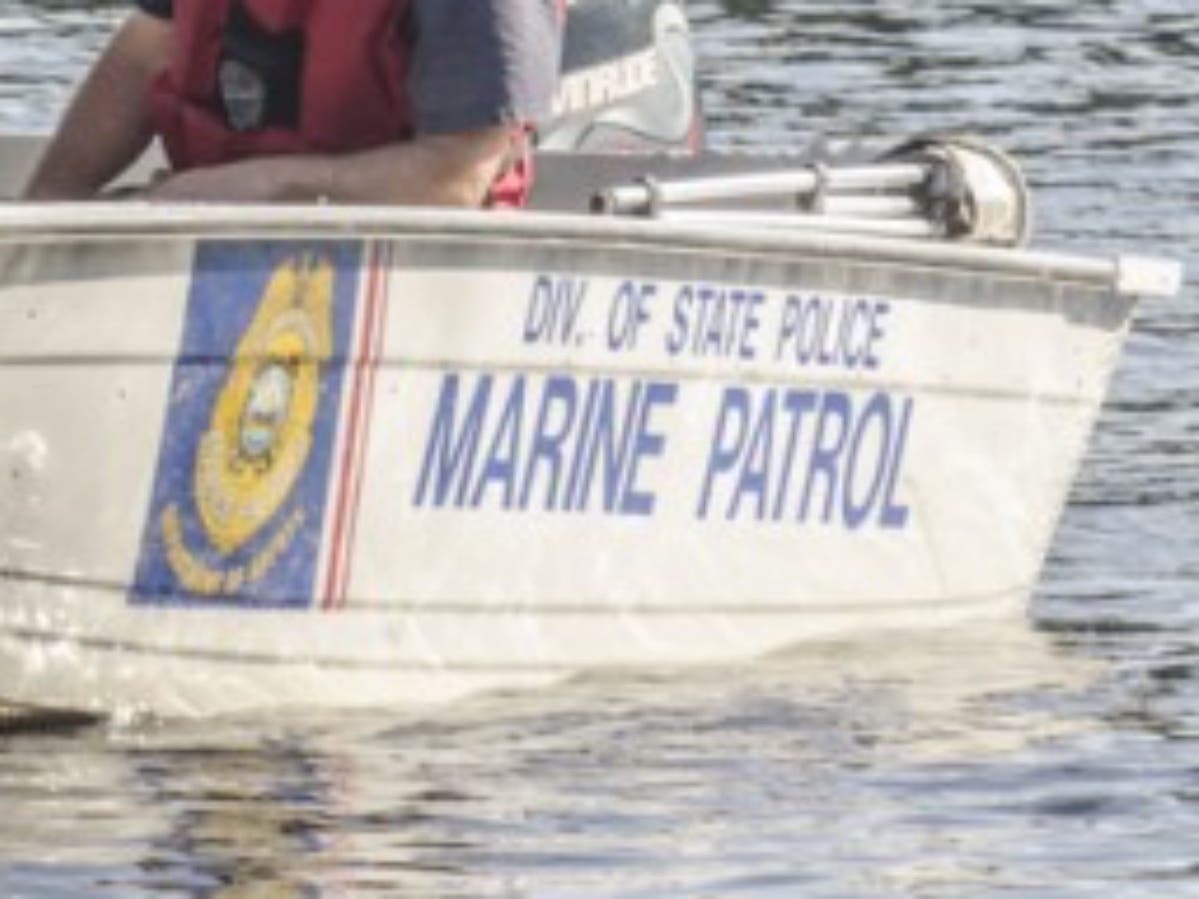 A file photo of the New Hampshire State Police Marine Patrol searching the Merrimack River in Concord. 