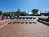 City officials participate in a national day of mourning at Nashua City Hall June 1, including 14 empty chairs to acknowledge Gate City residents who have died. 