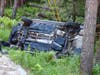 A car overturned into a creek in Canterbury June 9. 