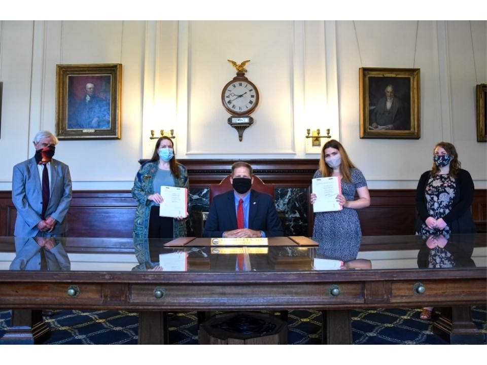 From left to right: State Sen. Jeb Bradley, state Rep. Katherine Prudhomme O'Brien, Gov. Chris Sununu, Ana Goble of Concord, and Pamela Keilig from the New Hampshire Coalition Against Domestic & Sexual Violence.
