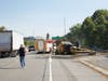 A truck rolled its trailer and cargo, an excavator, on the Interstate 393 onramp Sept. 21 in Concord.
