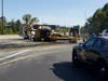 A truck rolled its trailer and cargo, an excavator, on the Interstate 393 onramp Sept. 21 in Concord.