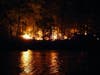 Firefighters battled a fire on an island in the middle of the Merrimack River off Hall Street Sept. 22.