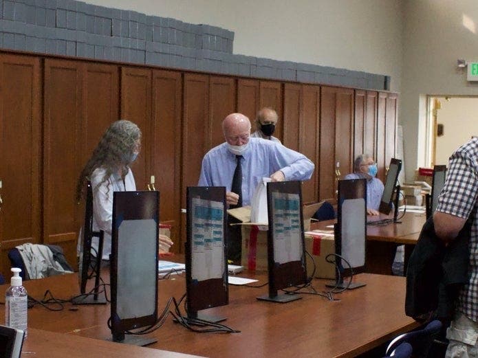 Secretary of State Bill Gardner sorts ballots Sept. 16 during a recent recount after the state's primary election.