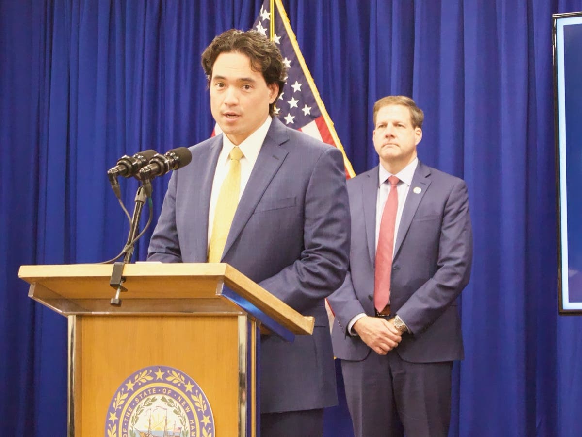 Dr. Benjamin Chan makes a point during a news conference on Dec. 3. 