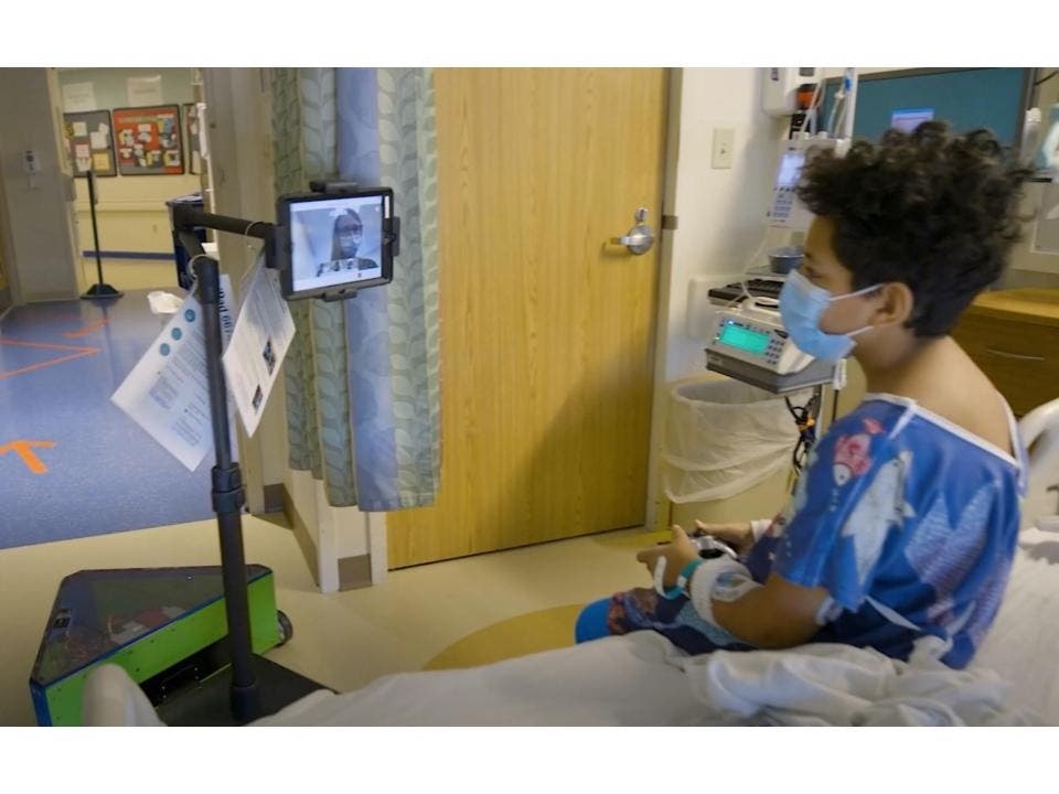 Dartmouth-Hitchcock recently introduced remote-controlled robots to deliver iPads to patient bedsides for tele-health purposes and to help patients and loved ones stay connected while reducing patient and staff exposure and conserving PPE.