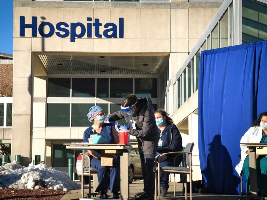 Heidi Kukla, a nurse in Elliot Hospital's intensive care unit, was the first individual to receive the Pfizer/BioNTech COVID-19 vaccine in the state of New Hampshire on Dec. 15. 