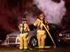 Firefighters extinguish a car fire in Bow on Jan. 18. 