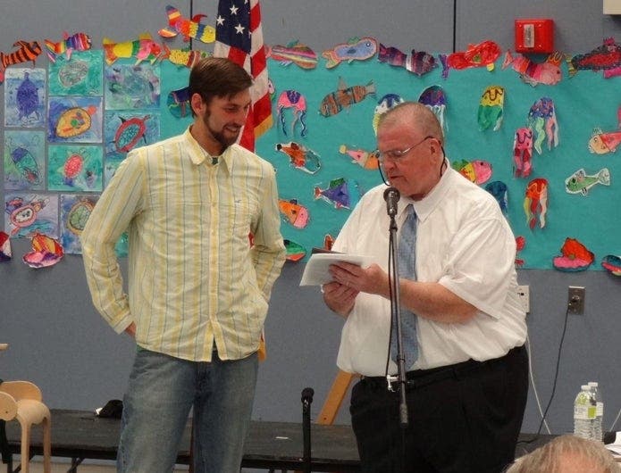 In this Patch file photo, Dick Patten, right, is pictured at a Concord Pineconia Grange Awards Ceremony on the Concord Heights.