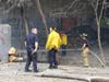 Witnesses reported hearing explosions and black smoke billowing from underneath the Water Street bridge on April 8 after another homeless camp fire in Concord.