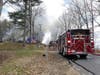 A fire in a garage that burned a vehicle and extended to a home and brush was reported in Barnstead on April 18.