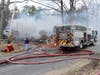A fire in a garage that burned a vehicle and extended to a home and brush was reported in Barnstead on April 18.