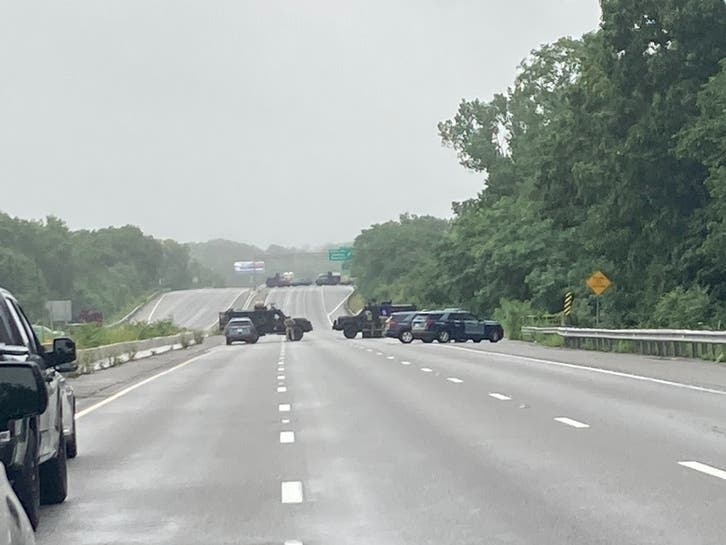 Massachusetts State Police and local police issued a “shelter-in-place” in Reading, Stoneham, and Wakefield after a heavily armed group of men ran away from state police during an incident on Interstate 95 on July 3.