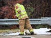 Concord firefighters clean up a gas spill on Sheep Davis Road on Dec. 11. 