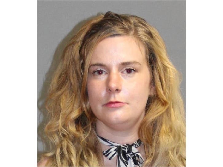 Chelsie Morgan of Hudson was arrested in Hooksett accused of biting an officer after refusing to leave a public road near an Interstate onramp. 