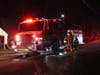 Firefighters from around Concord battle a blaze in Dunbarton on Robert Rogers Road on Jan. 22.
