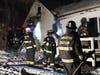 Firefighters from around Concord battle a blaze in Dunbarton on Robert Rogers Road on Jan. 22.