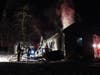 Firefighters from around Concord battle a blaze in Dunbarton on Robert Rogers Road on Jan. 22.