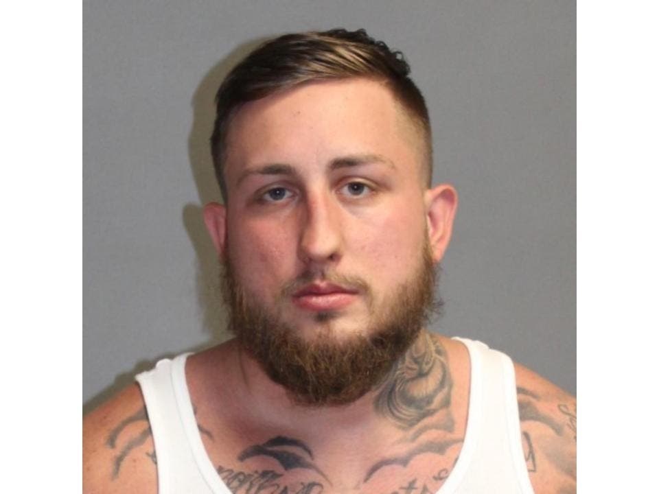 Andrew Lennartson was arrested on June 12 accused of shooting another person outside a Nashua restaurant. 