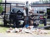 A pickup truck crashed into the National Guard fence near Pembroke Road in Concord on June 13. 