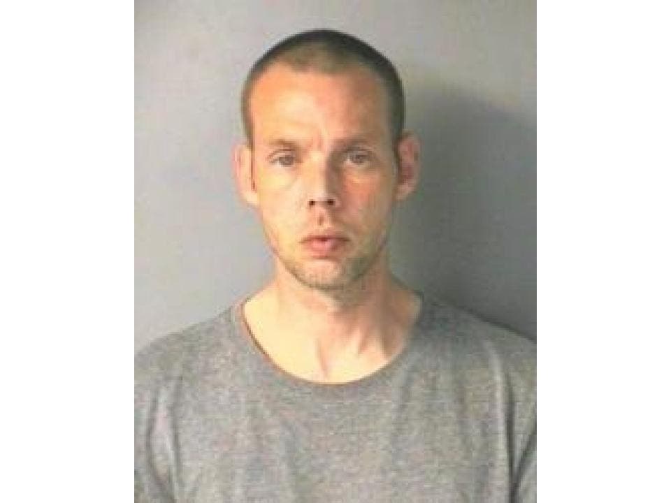 Justin Dutton of Manchester, a felon with active drug cases, was arrested by New Hampshire State Police after a chase on Interstate 93 on July 16. 